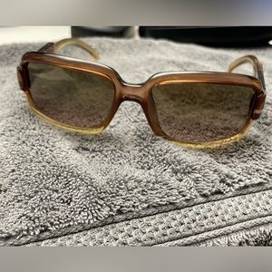 Vintage Gucci sunglasses in brown with Gucci logo